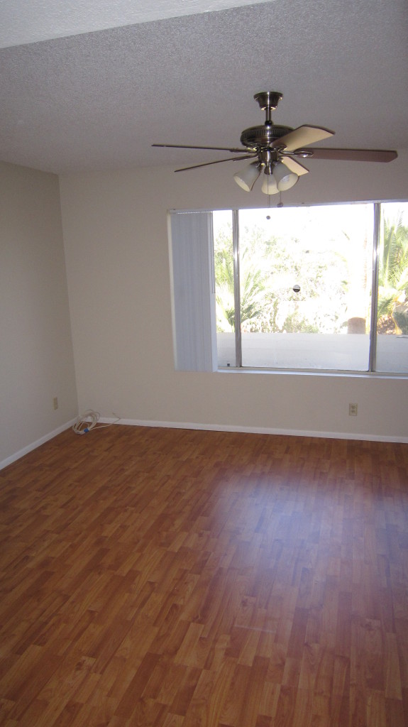 4334 East Decatur Street Mesa, AZ 85205 - Photo 22 of 37 Master Bedroom w/ New Pergo Flooring