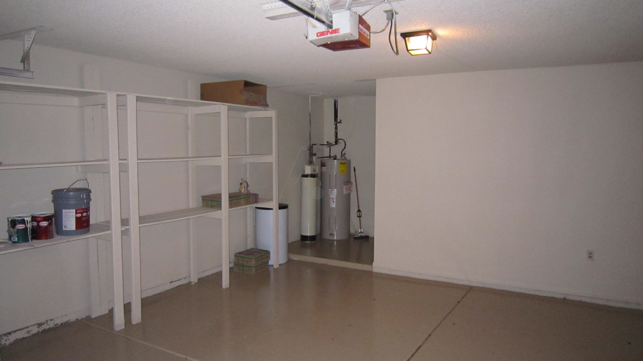 4334 East Decatur Street Mesa, AZ 85205 - Photo 36 of 37 Garage w/ Storage and Epoxy Flooring