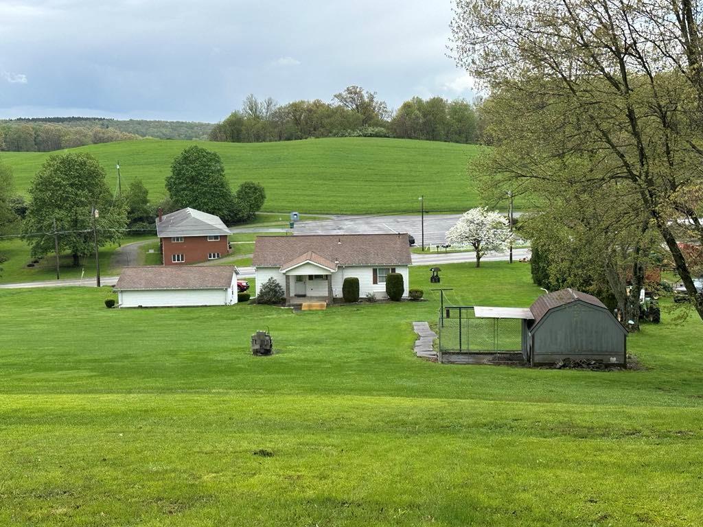 861 Chicora Road Chicora, PA 16025 - Photo 26 of 30 a view of a garden with an outdoor space