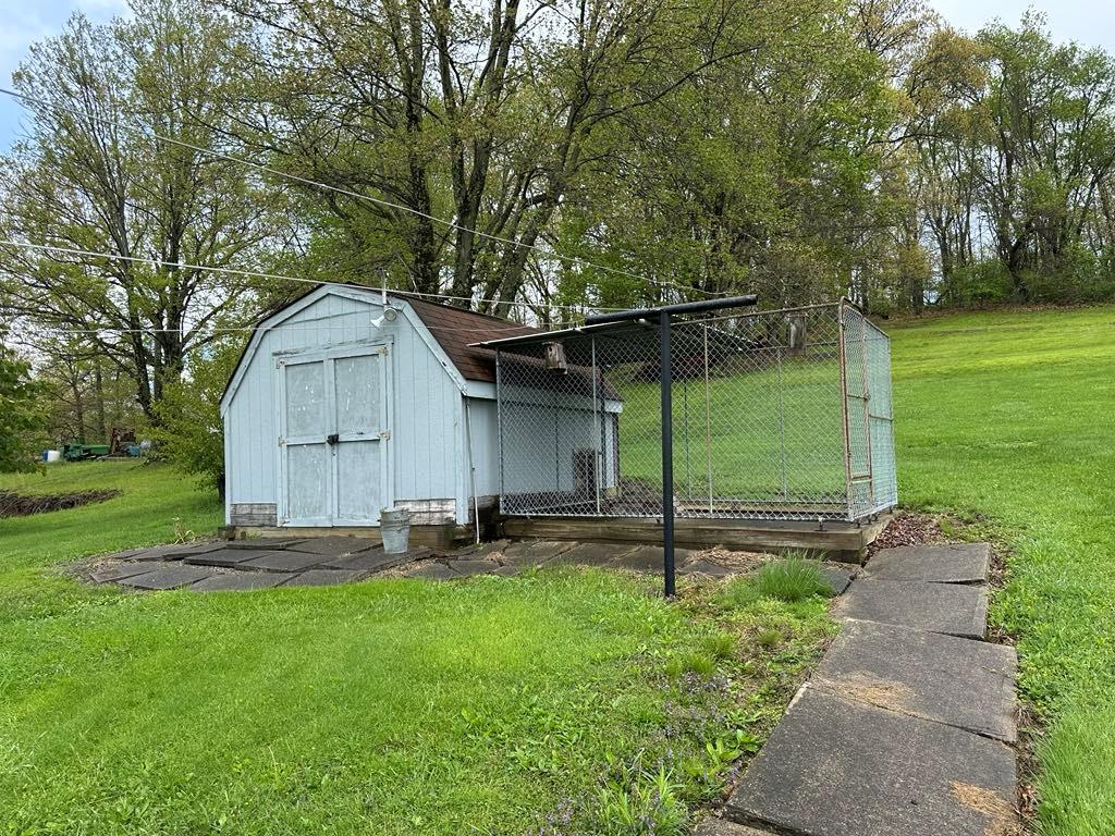 861 Chicora Road Chicora, PA 16025 - Photo 27 of 30 a front view of a house with garden