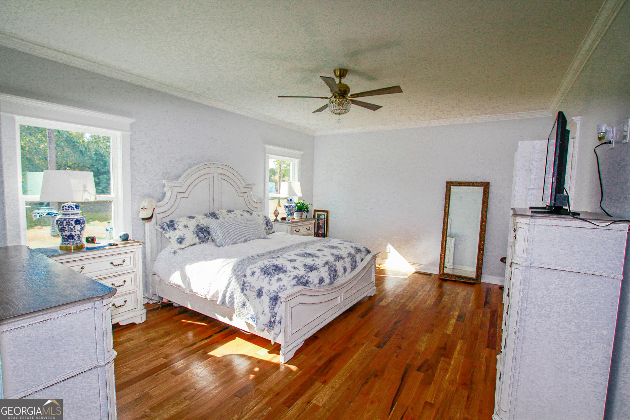 1010 Rock Road Perry, GA 31069 - Photo 31 of 58 a bedroom with a bed and a large window