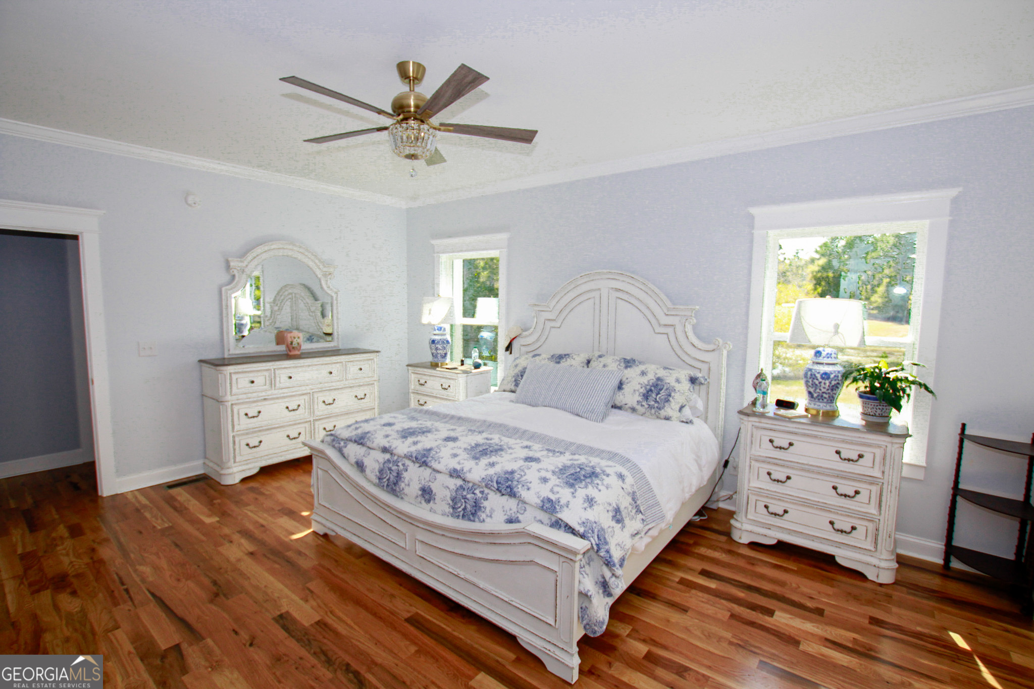 1010 Rock Road Perry, GA 31069 - Photo 33 of 58 a bedroom with a bed and a dresser