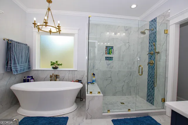 a bedroom with a bed and a television