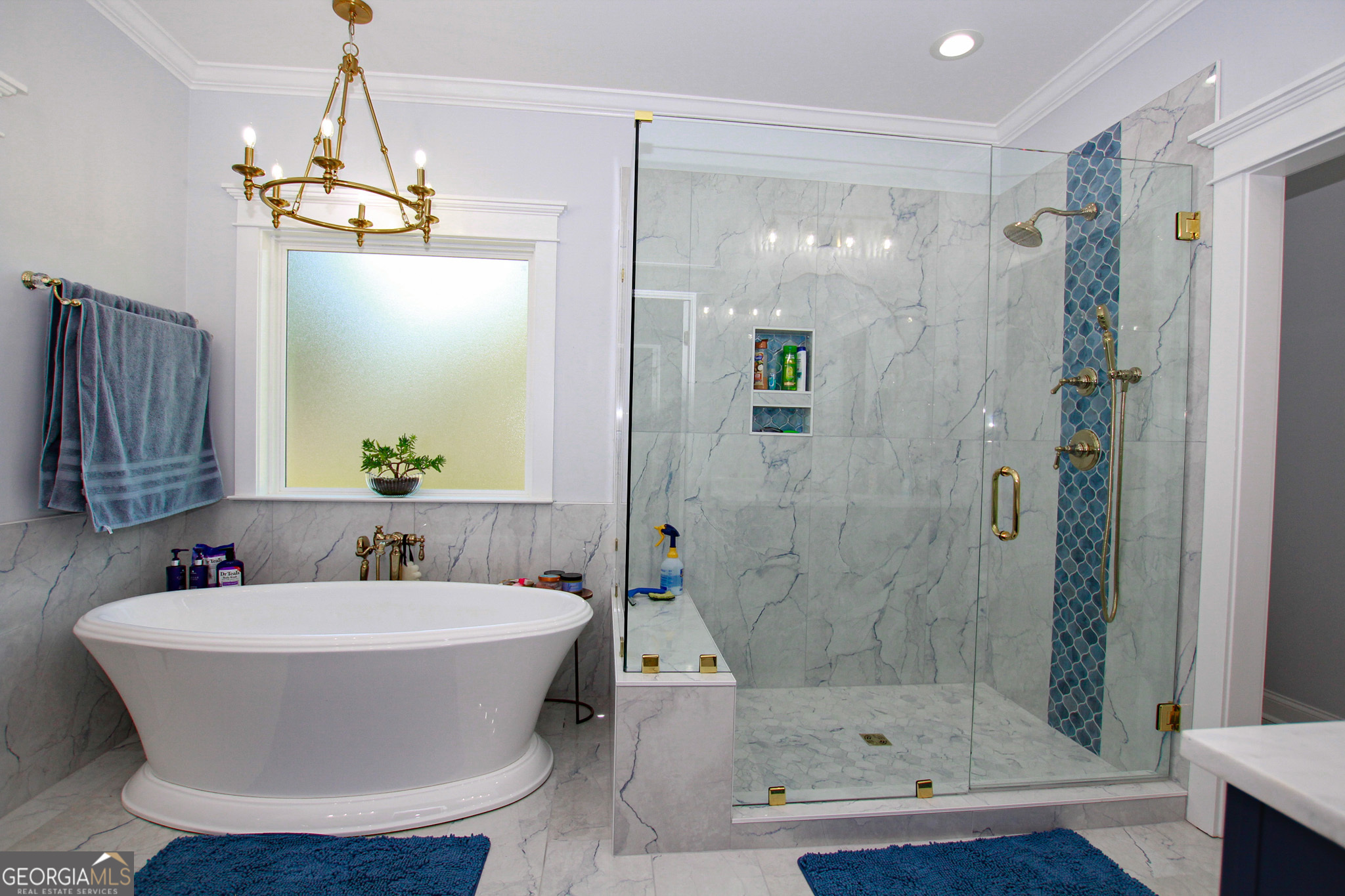 1010 Rock Road Perry, GA 31069 - Photo 36 of 58 a bathroom with a bathtub and a shower