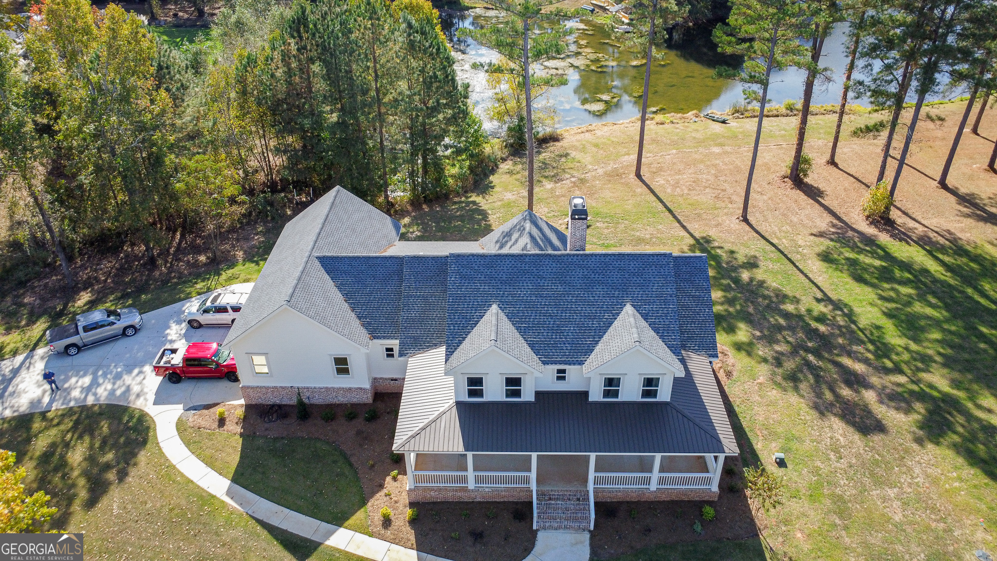 1010 Rock Road Perry, GA 31069 - Photo 44 of 58 a view of house with backyard space and sitting area
