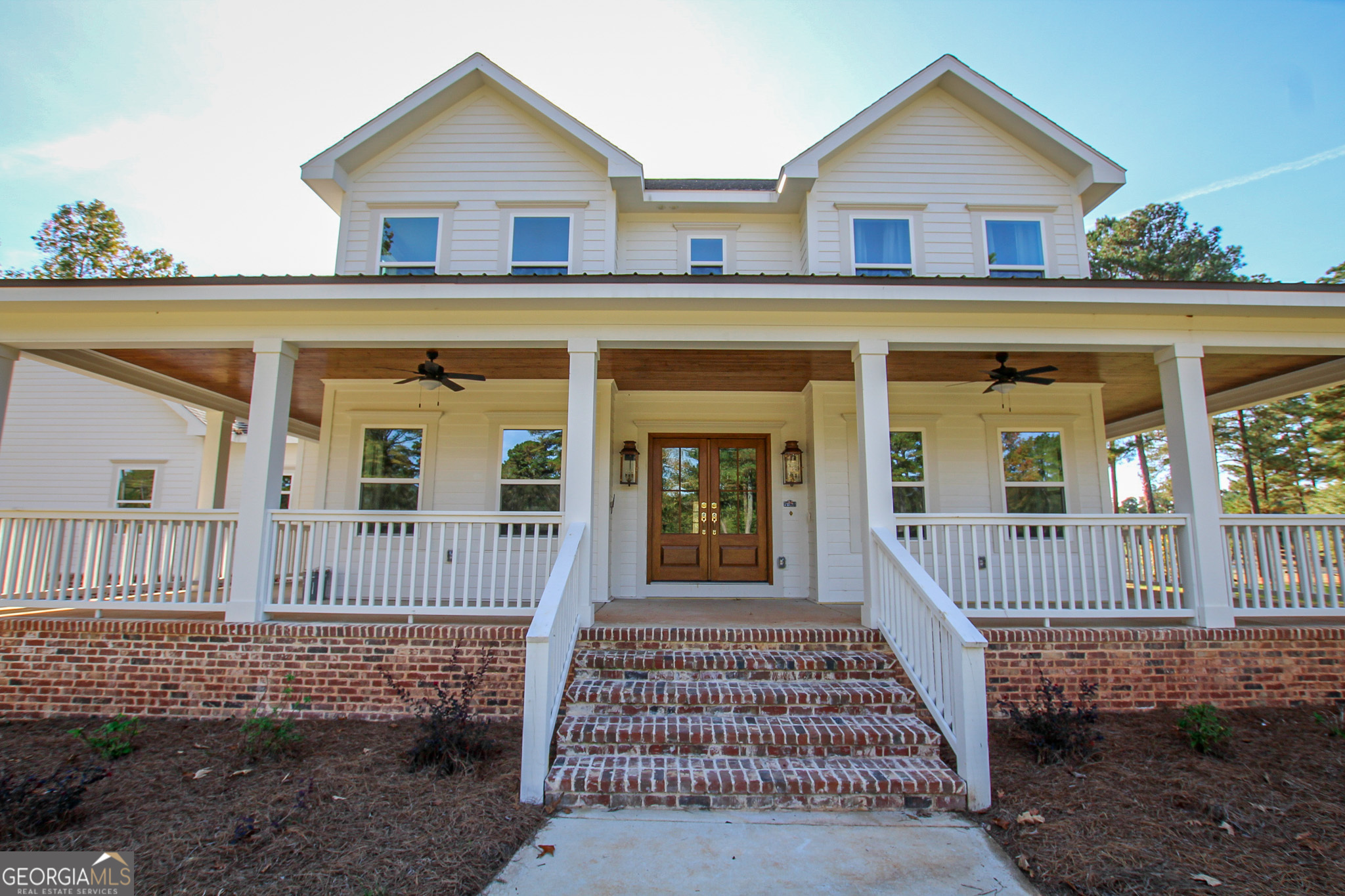 1010 Rock Road Perry, GA 31069 - Photo 47 of 58 a view of a house with a yard