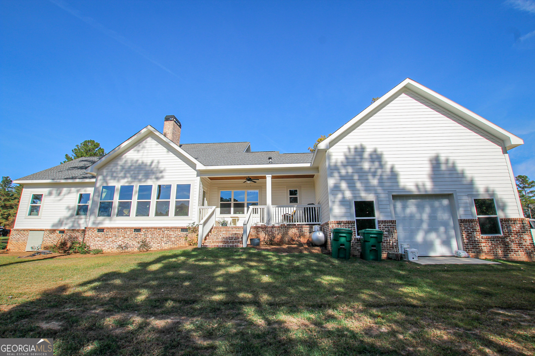 1010 Rock Road Perry, GA 31069 - Photo 48 of 58 a view of a house with a yard