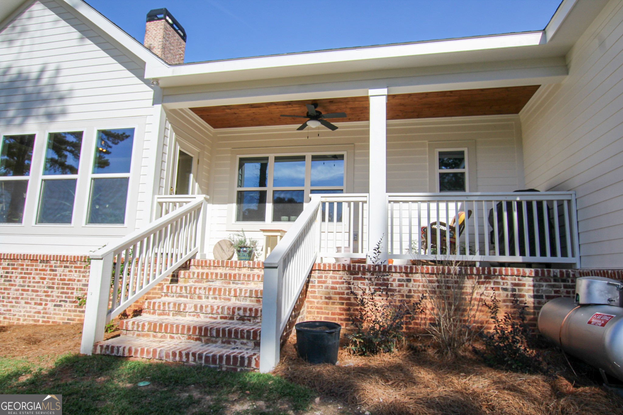 1010 Rock Road Perry, GA 31069 - Photo 49 of 58 a view of a house with wooden deck