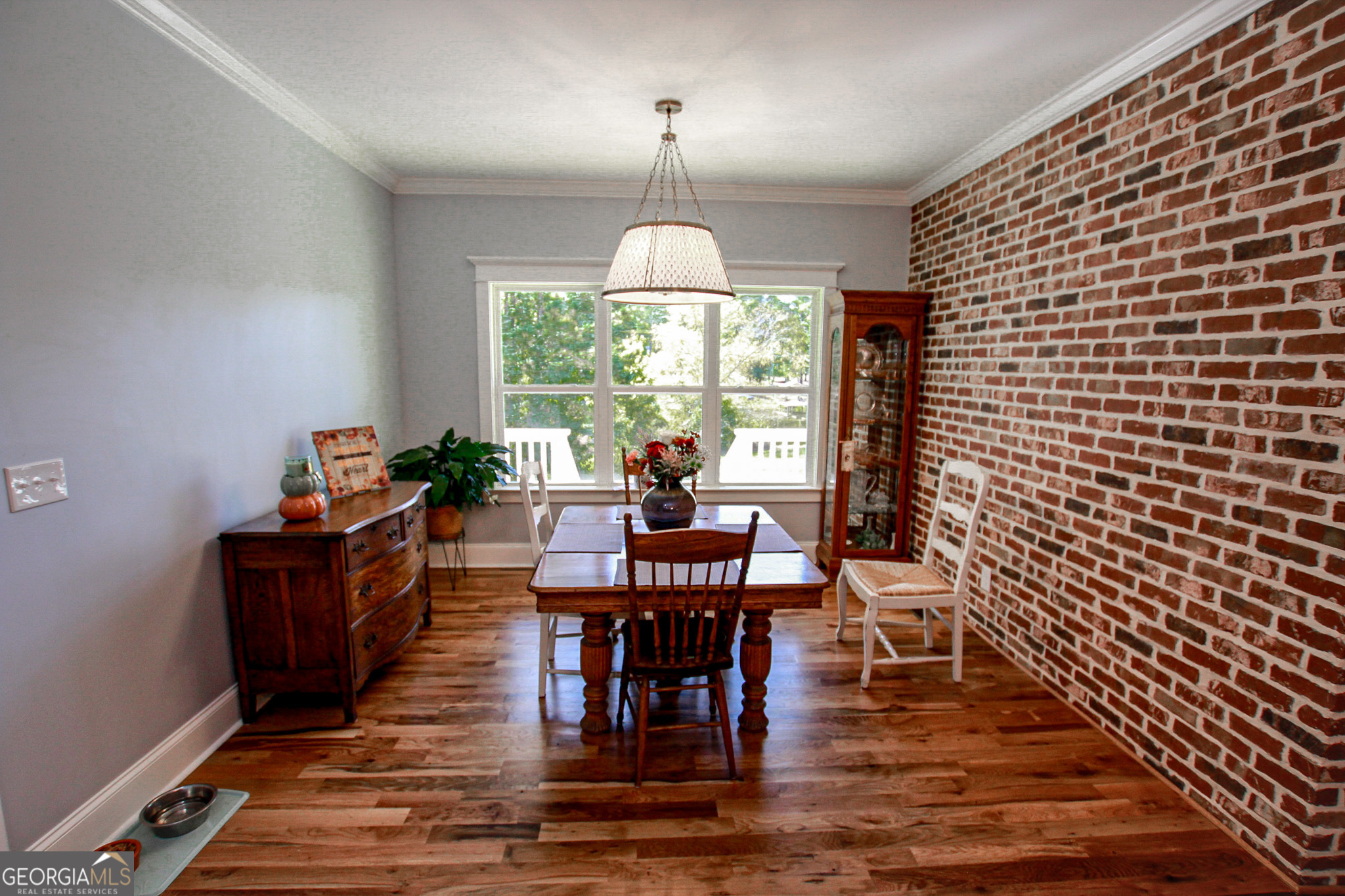1010 Rock Road Perry, GA 31069 - Photo 6 of 58 a view of a dining room with furniture window and outside view