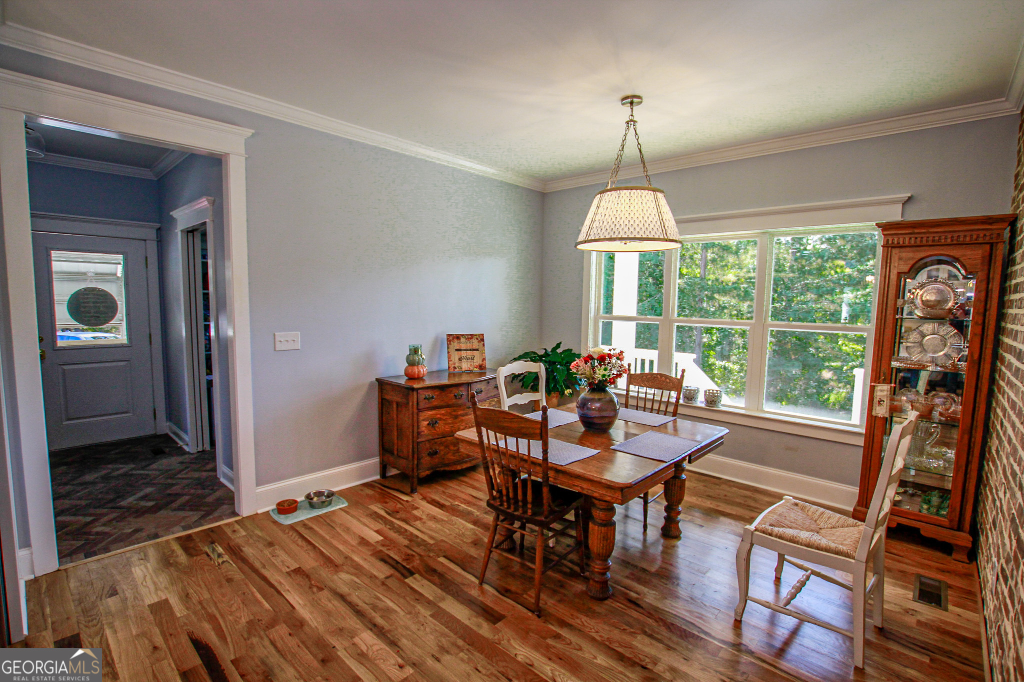1010 Rock Road Perry, GA 31069 - Photo 7 of 58 a view of a dining room with furniture window and outside view