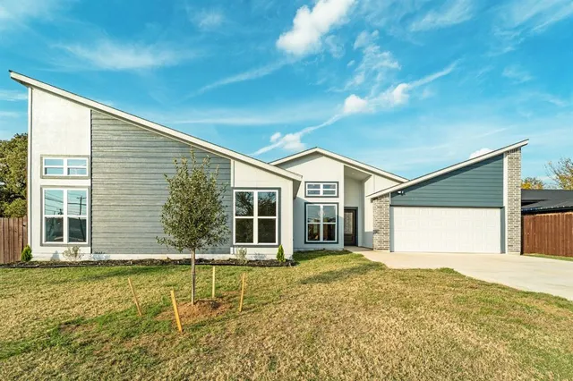a view of a house with a swimming pool