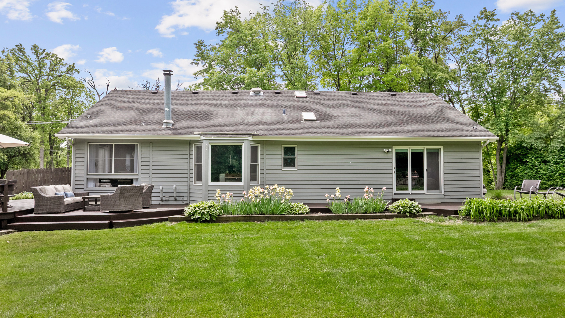 28W140 Mack Road Wheaton, IL 60189 - Photo 40 of 48 a front view of house with yard and green space