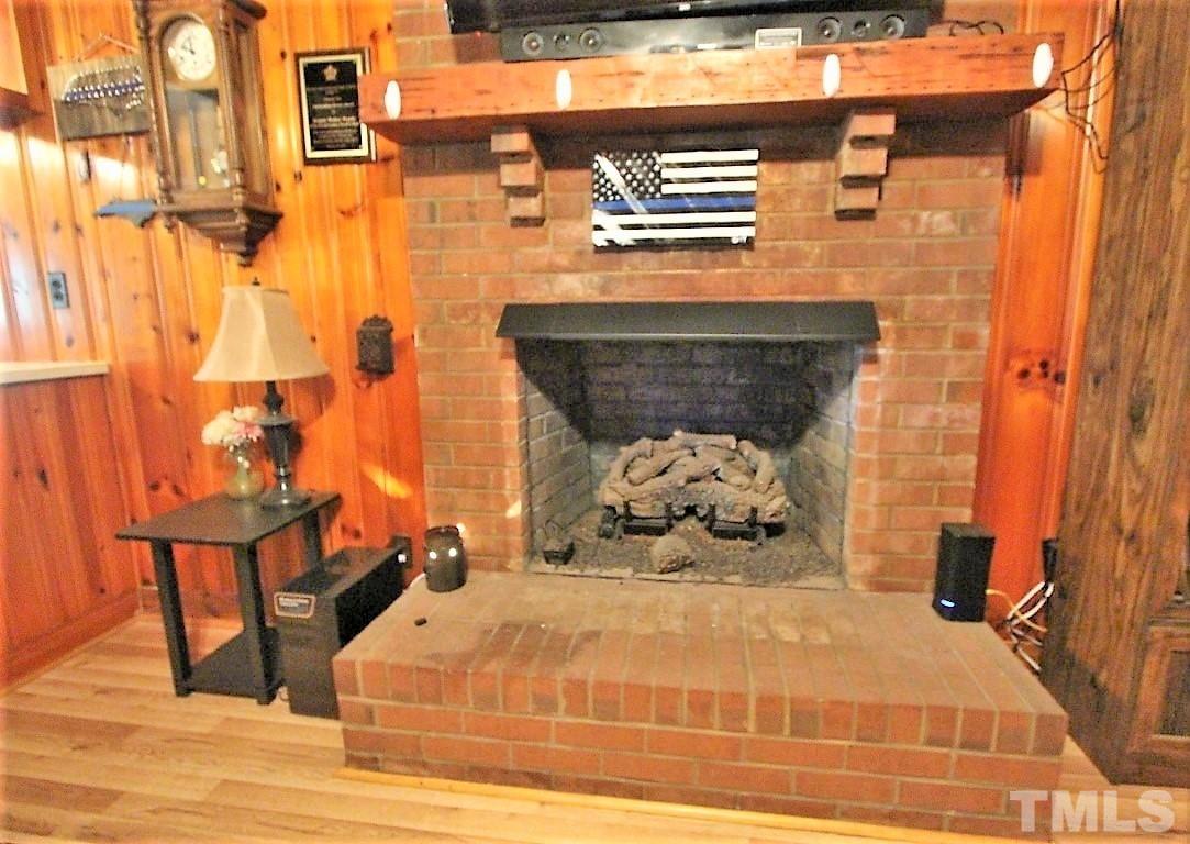 199 Carver Holt Road Roxboro, NC 27574 - Photo 8 of 23 a bedroom with a bed and a table