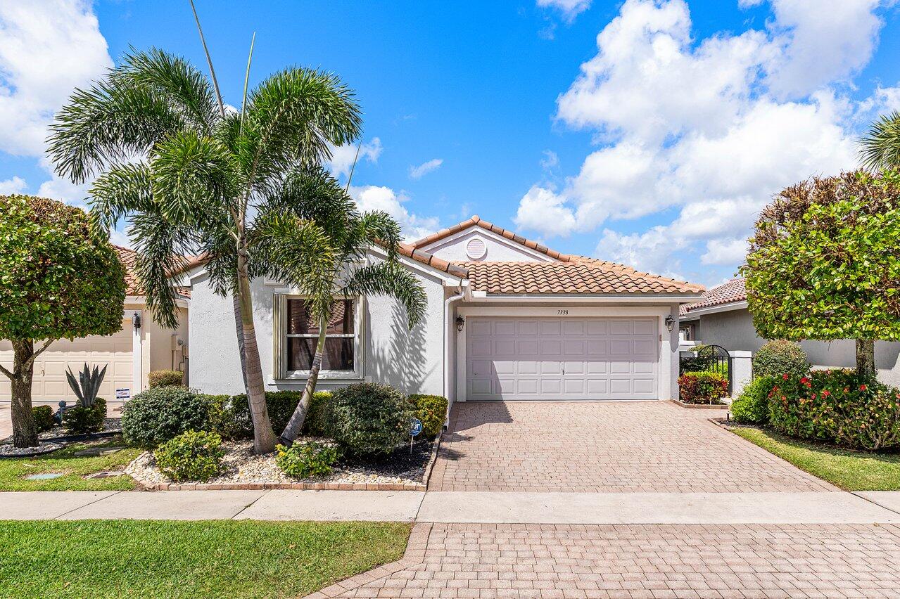 7338 Chorale Road Boynton Beach, FL 33437 - Photo 1 of 23 Front