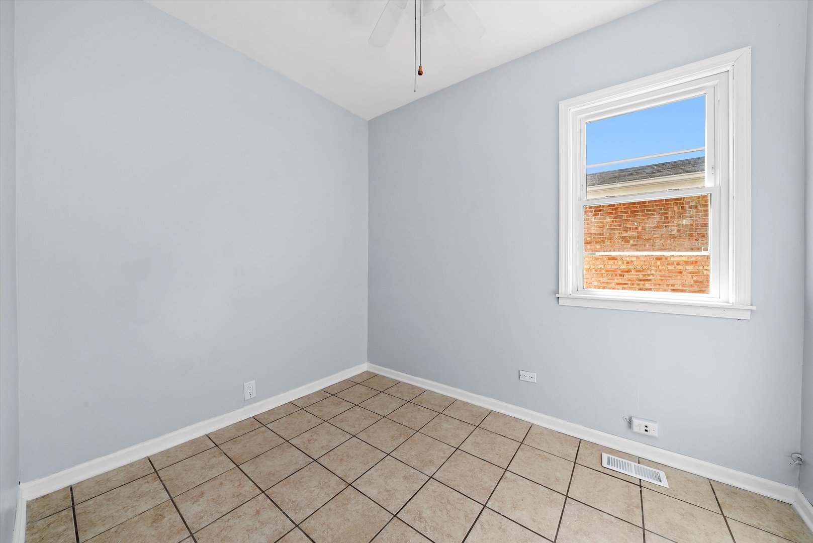 3604 West 65th Place Chicago, IL 60629 - Photo 16 of 27 a view of an empty room and window