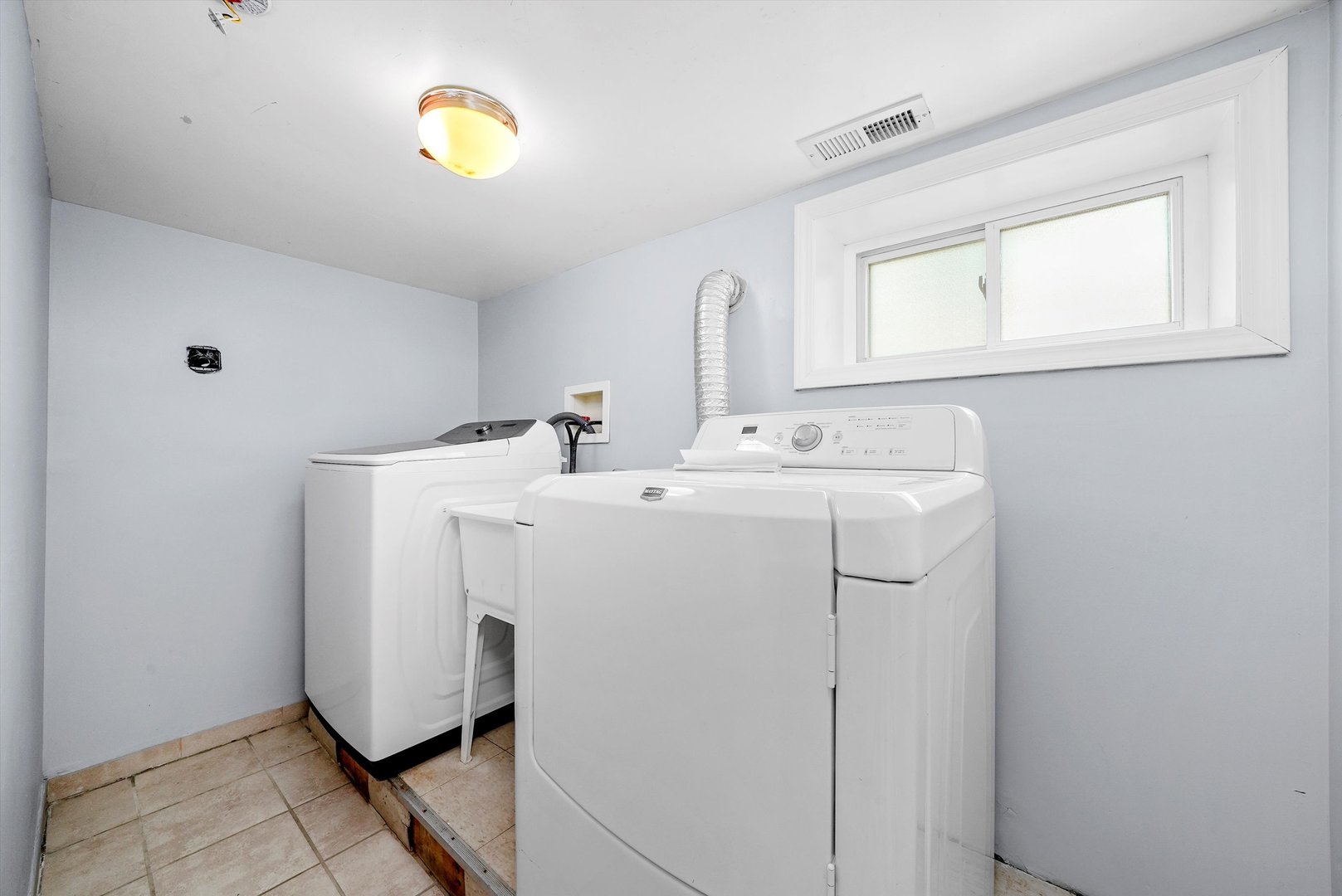 3604 West 65th Place Chicago, IL 60629 - Photo 23 of 27 a utility room with dryer and washer