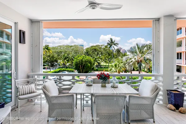 a outdoor dining space with furniture