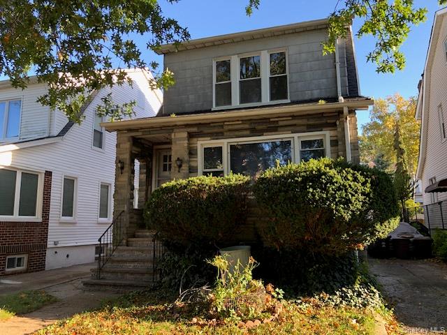 173-32 82nd Avenue Queens, NY 11432 - Photo 1 of 6 View of front facade featuring stone siding