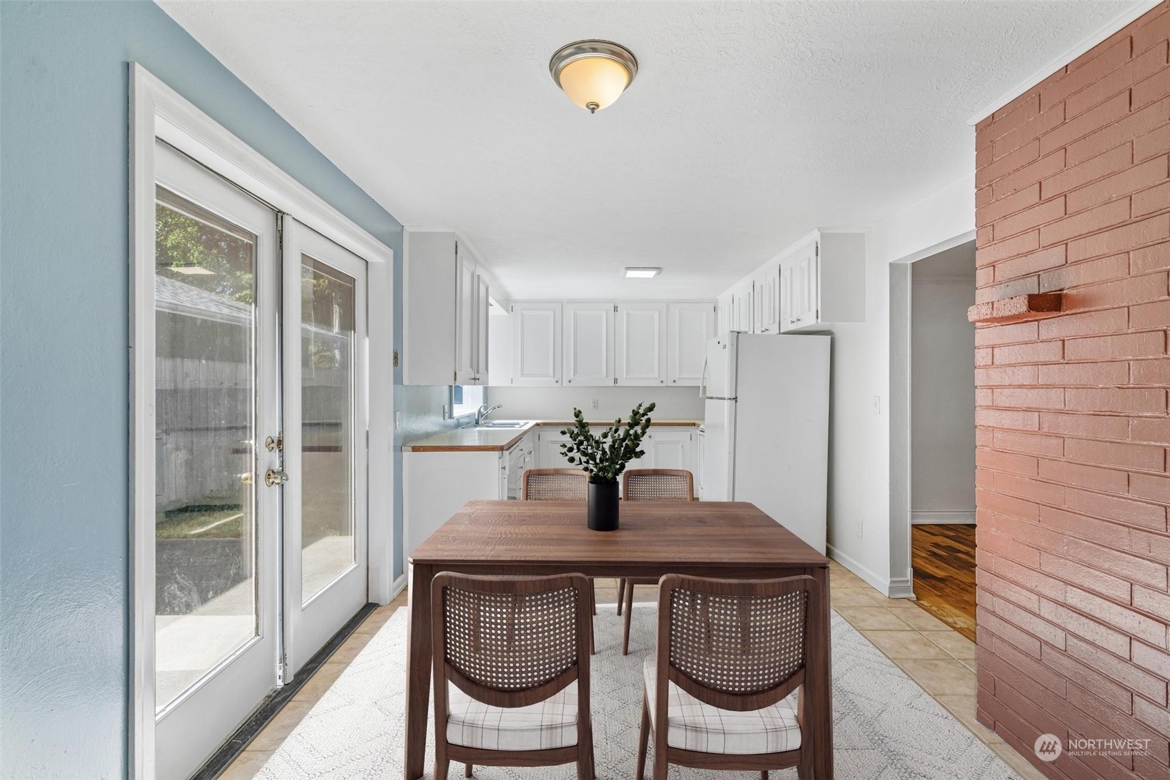 229 V Street Southwest Tumwater, WA 98501 - Photo 12 of 38 a kitchen with a table and chairs