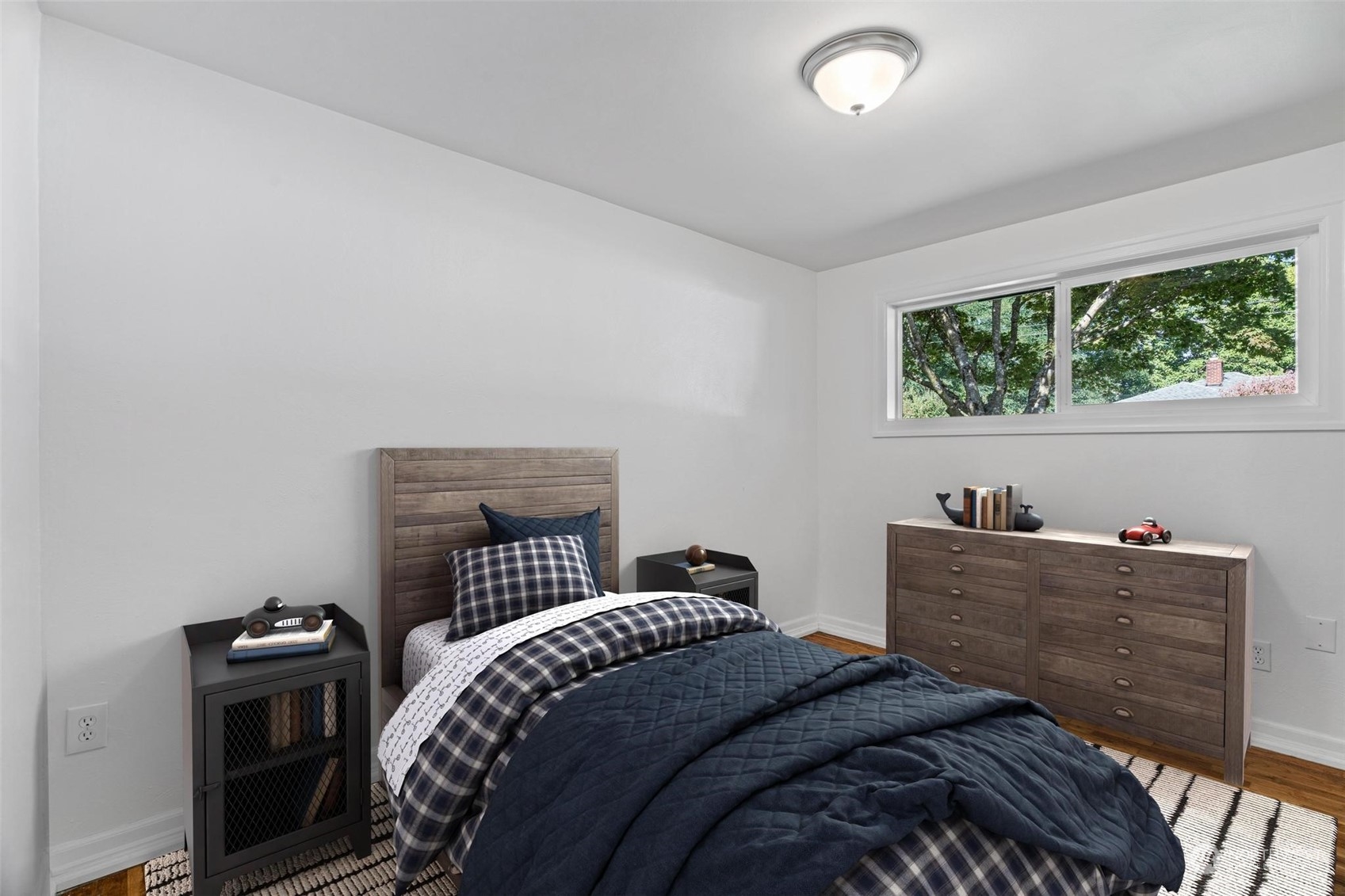 229 V Street Southwest Tumwater, WA 98501 - Photo 13 of 38 a bedroom with a bed and a window