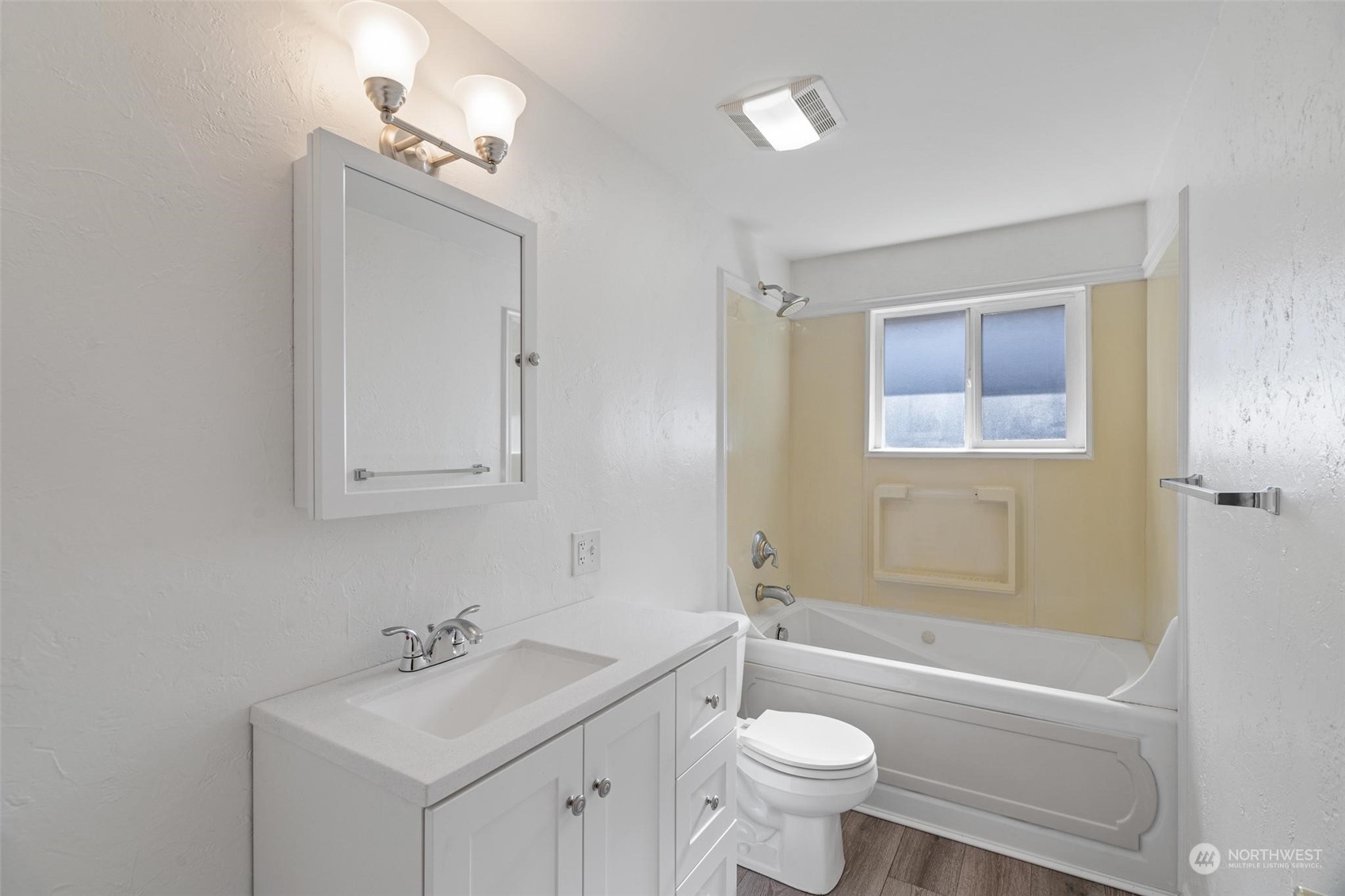 229 V Street Southwest Tumwater, WA 98501 - Photo 16 of 38 a bathroom with a sink toilet tub and vanity