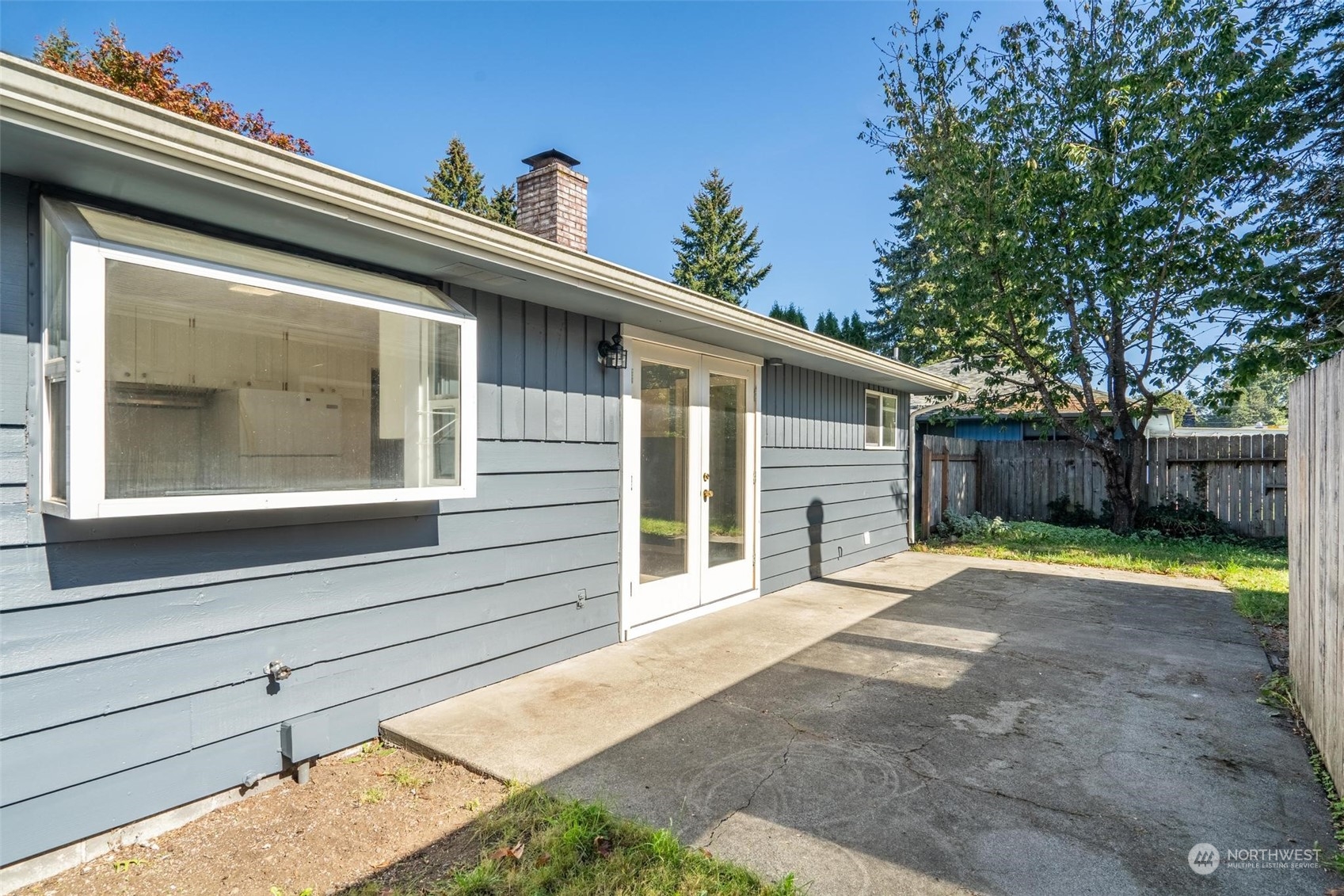 229 V Street Southwest Tumwater, WA 98501 - Photo 19 of 38 a view of a house with a patio