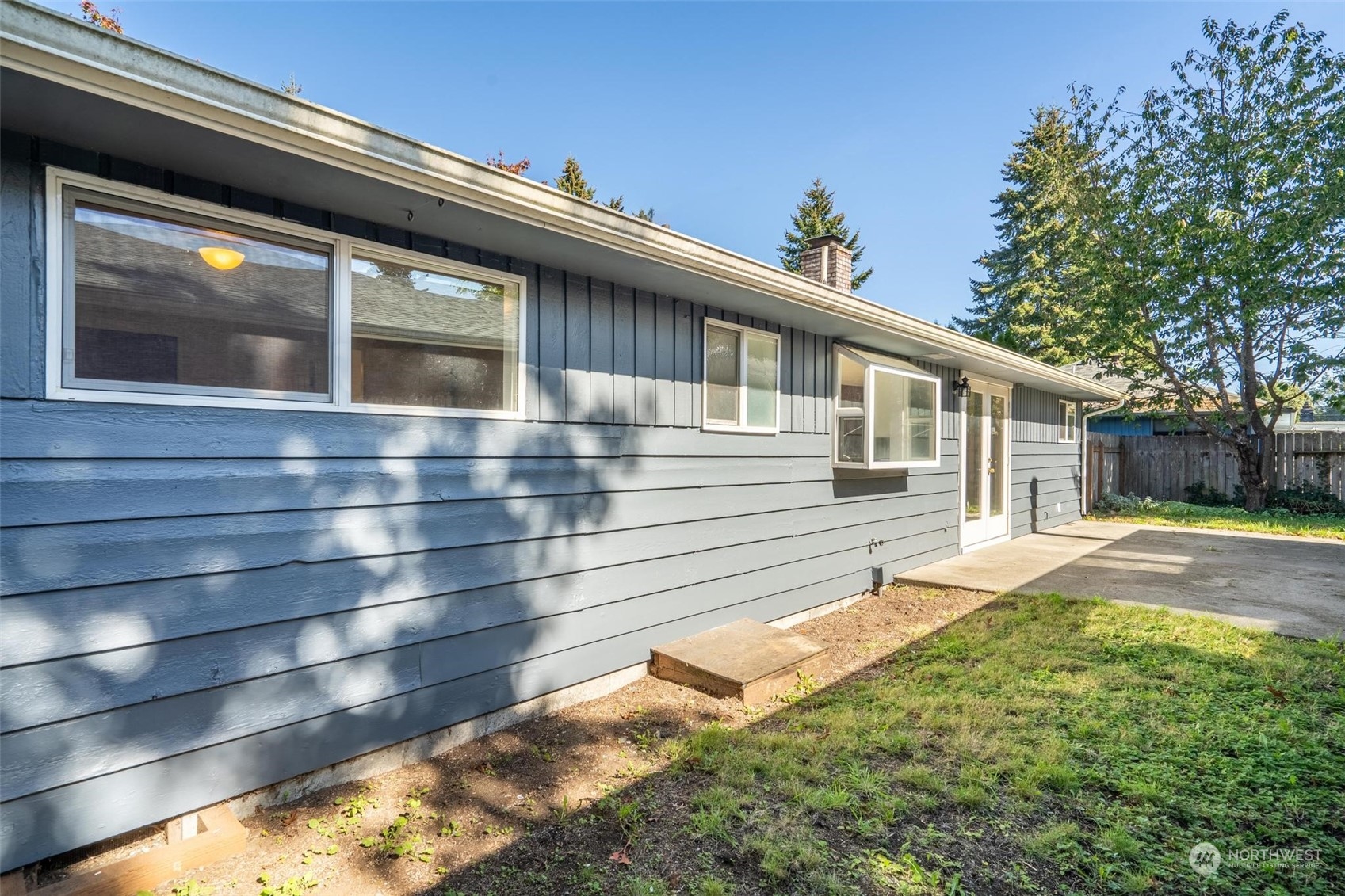 229 V Street Southwest Tumwater, WA 98501 - Photo 20 of 38 a view of a house with a yard