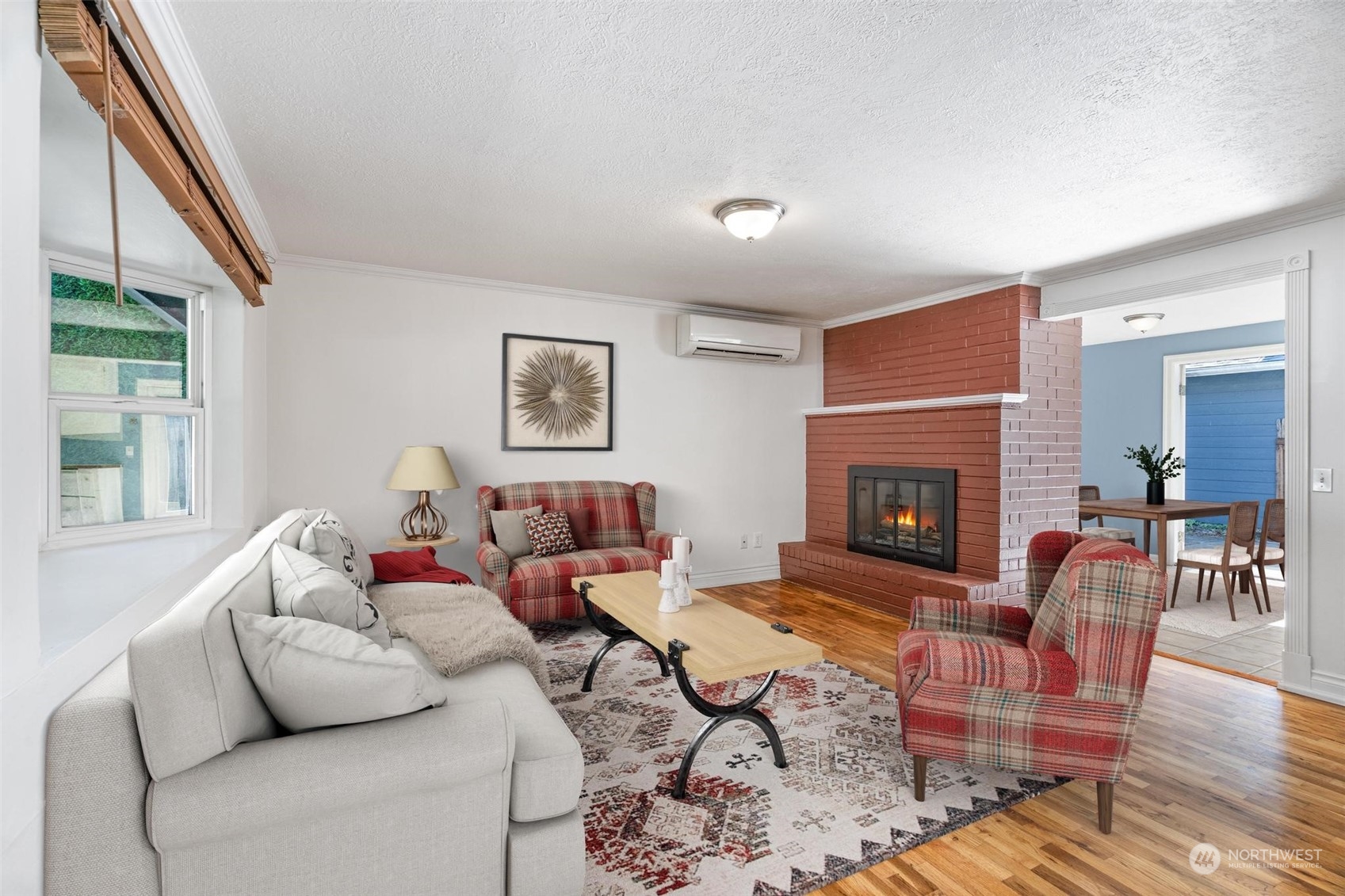 229 V Street Southwest Tumwater, WA 98501 - Photo 2 of 38 a living room with furniture and a fireplace