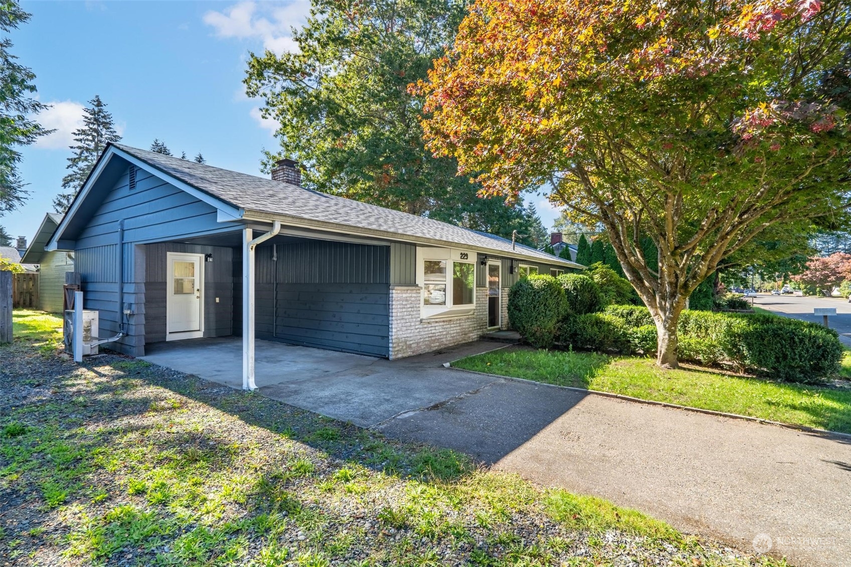 229 V Street Southwest Tumwater, WA 98501 - Photo 34 of 38 a view of a house with a yard