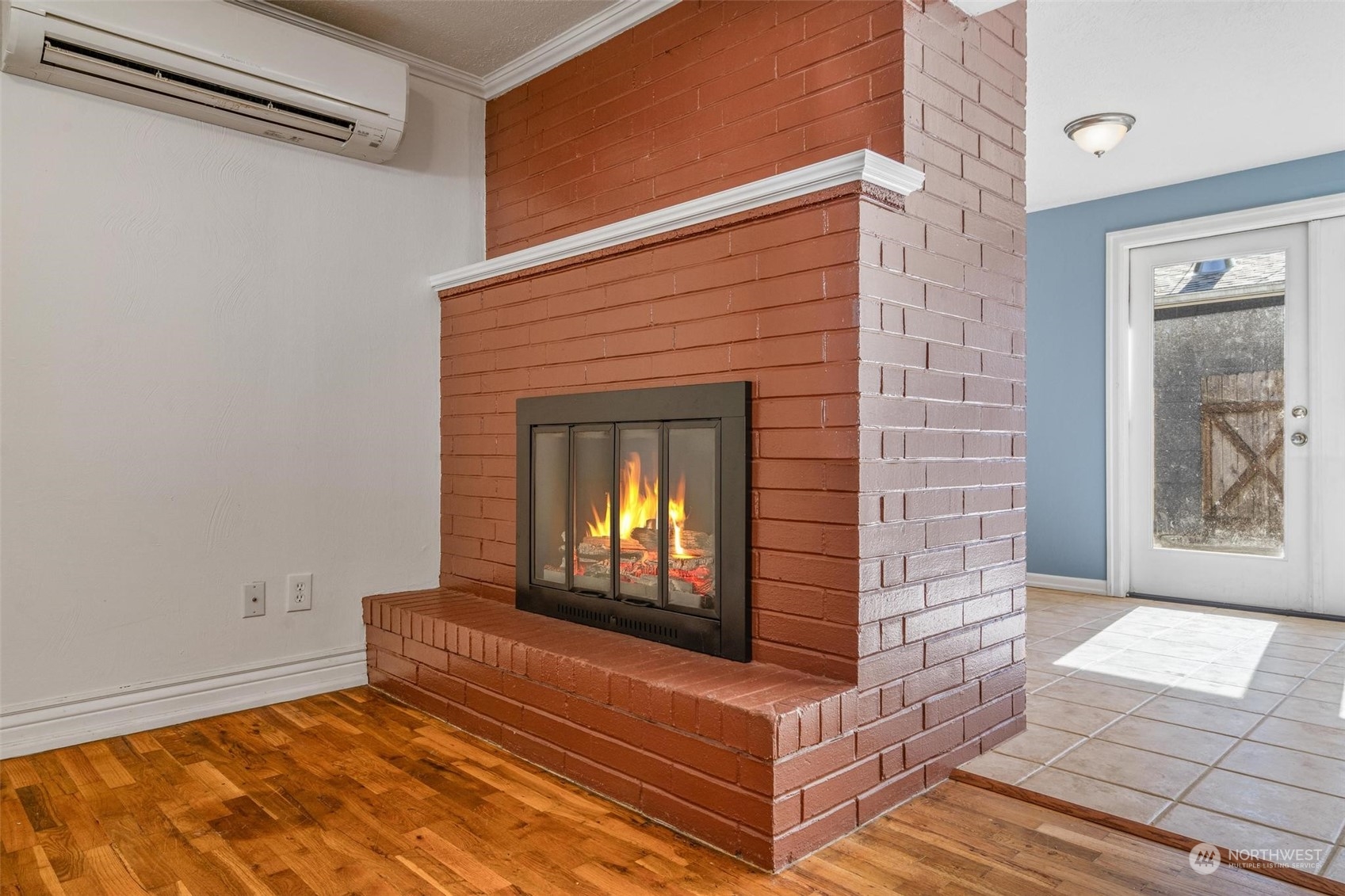 229 V Street Southwest Tumwater, WA 98501 - Photo 5 of 38 a view of an entryway with a fireplace