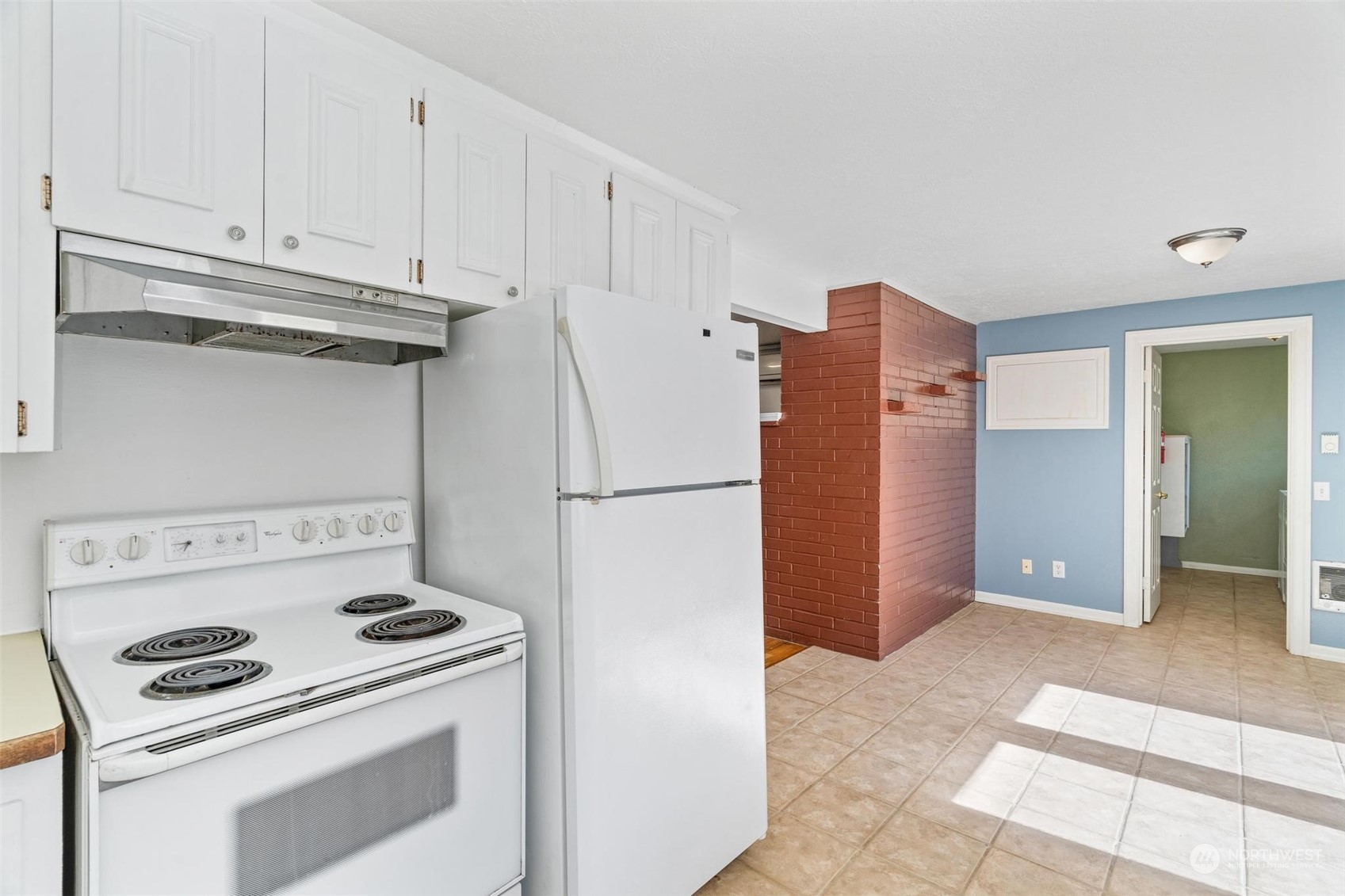 229 V Street Southwest Tumwater, WA 98501 - Photo 10 of 38 a kitchen with appliances and cabinets