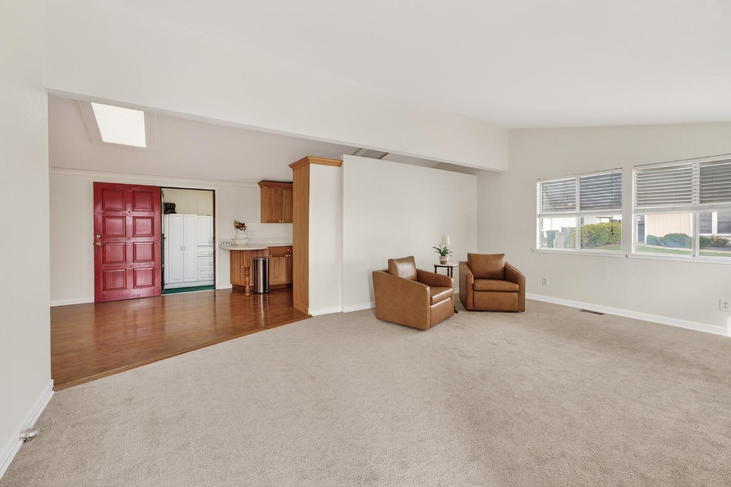 2755 North Walnut Road, Unit 114 Turlock, CA 95382 - Photo 6 of 28 a living room with furniture and a fireplace