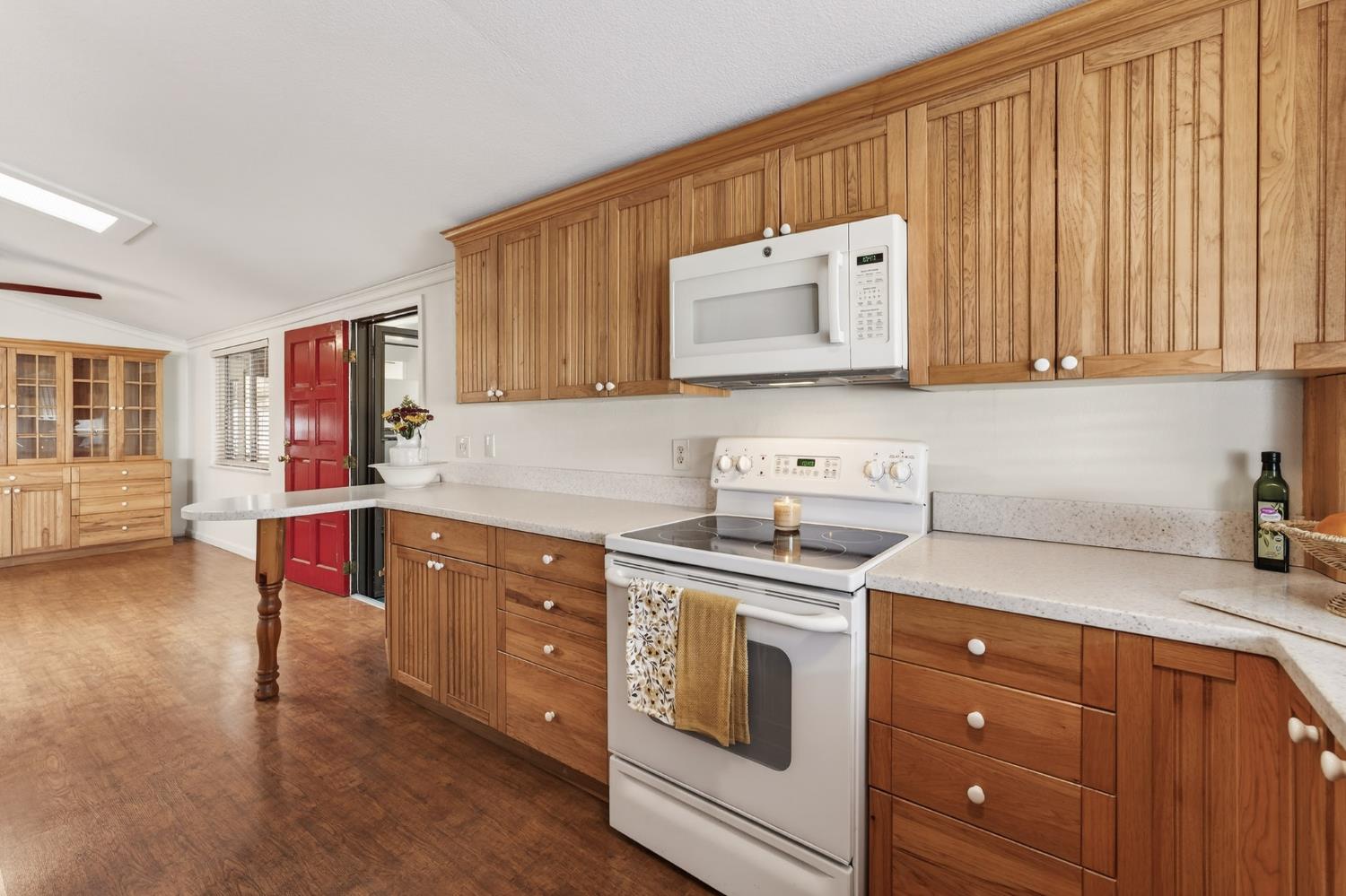 2755 North Walnut Road, Unit 114 Turlock, CA 95382 - Photo 10 of 28 a kitchen with stainless steel appliances granite countertop a sink stove and cabinets