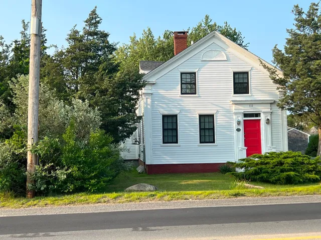 a front view of house with yard