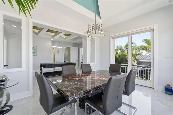 a view of living room with furniture and a fireplace