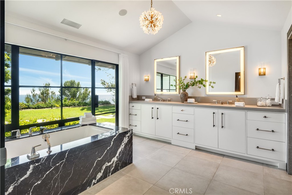 71 Crest Road East Rolling Hills, CA 90274 - Photo 12 of 23 a large bathroom with a large tub and sink