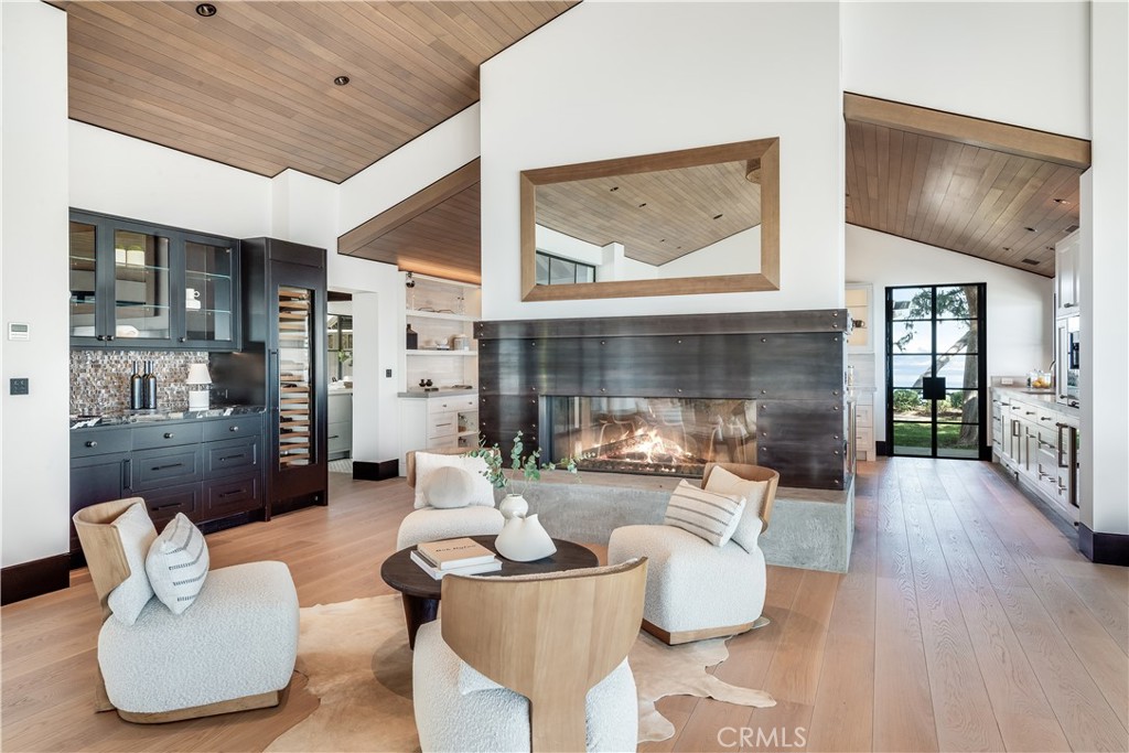 71 Crest Road East Rolling Hills, CA 90274 - Photo 4 of 23 a living room with furniture and a fireplace