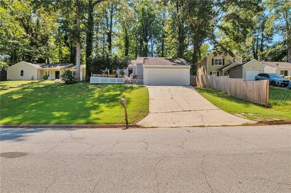 a house view with a garden space