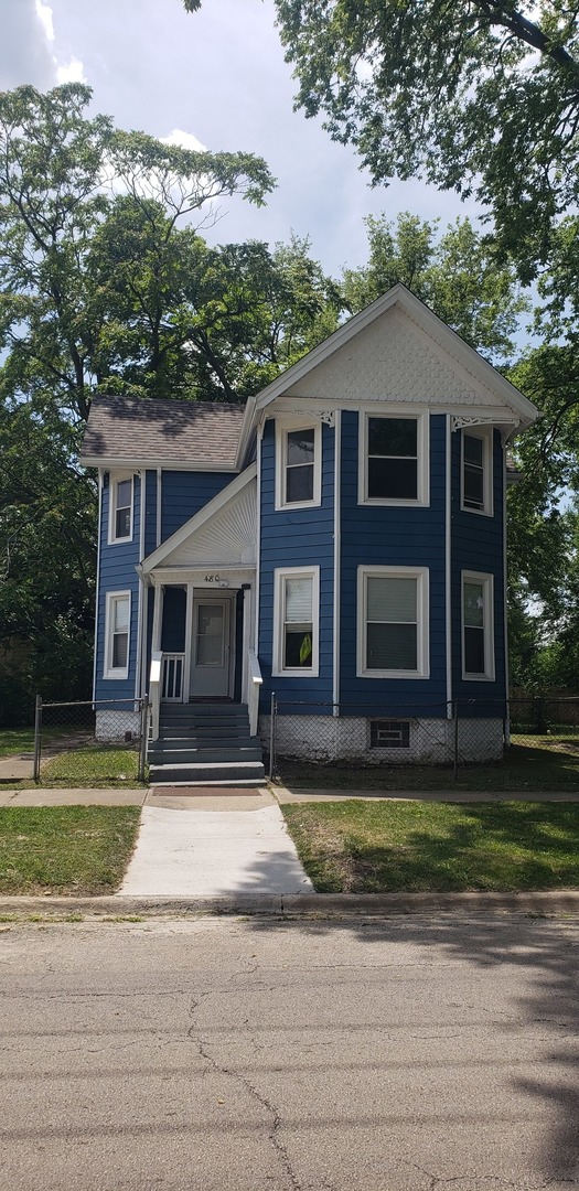 480 East Birch Street Kankakee, IL 60901 - Photo 18 of 19 a front view of a house with a yard
