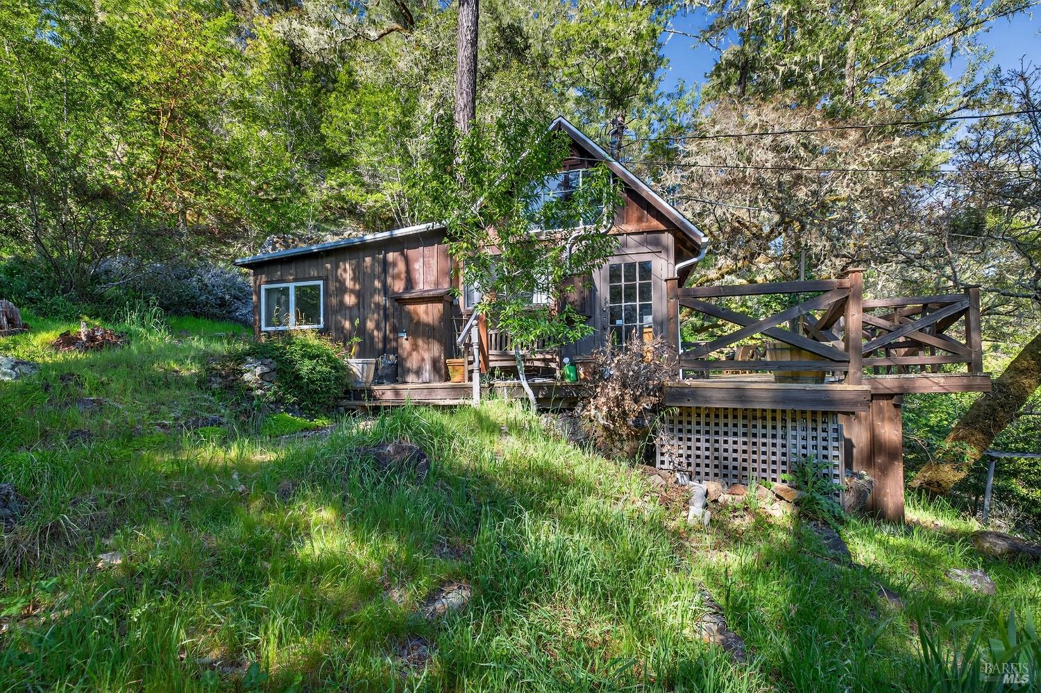 5925 Austin Creek Road Cazadero, CA 95421 - Photo 17 of 21 a view of house with a yard