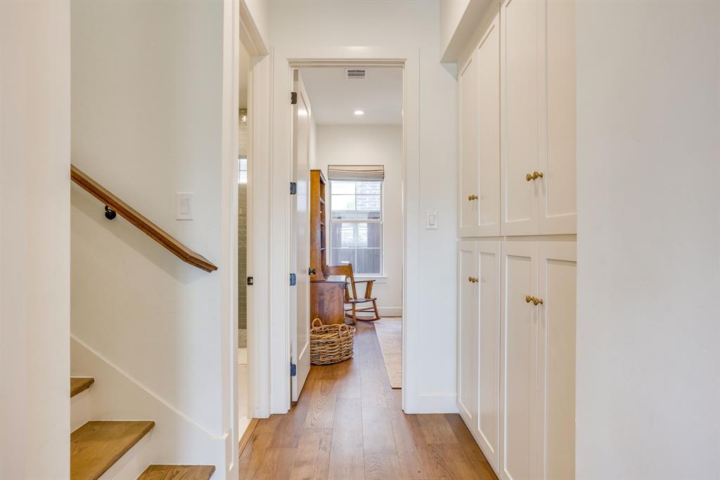 14000 Rozana Street Fort Worth, TX 76008 - Photo 25 of 38 a view of a hallway with wooden floor and staircase