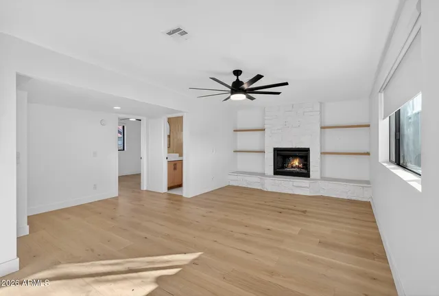 a kitchen with a stove and a sink