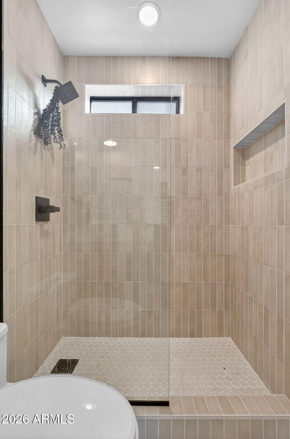 2223 East Claxton Avenue Gilbert, AZ 85297 - Photo 20 of 56 a bathroom with a shower and a toilet