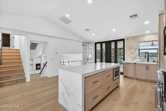 a view of a walk in closet and bedroom