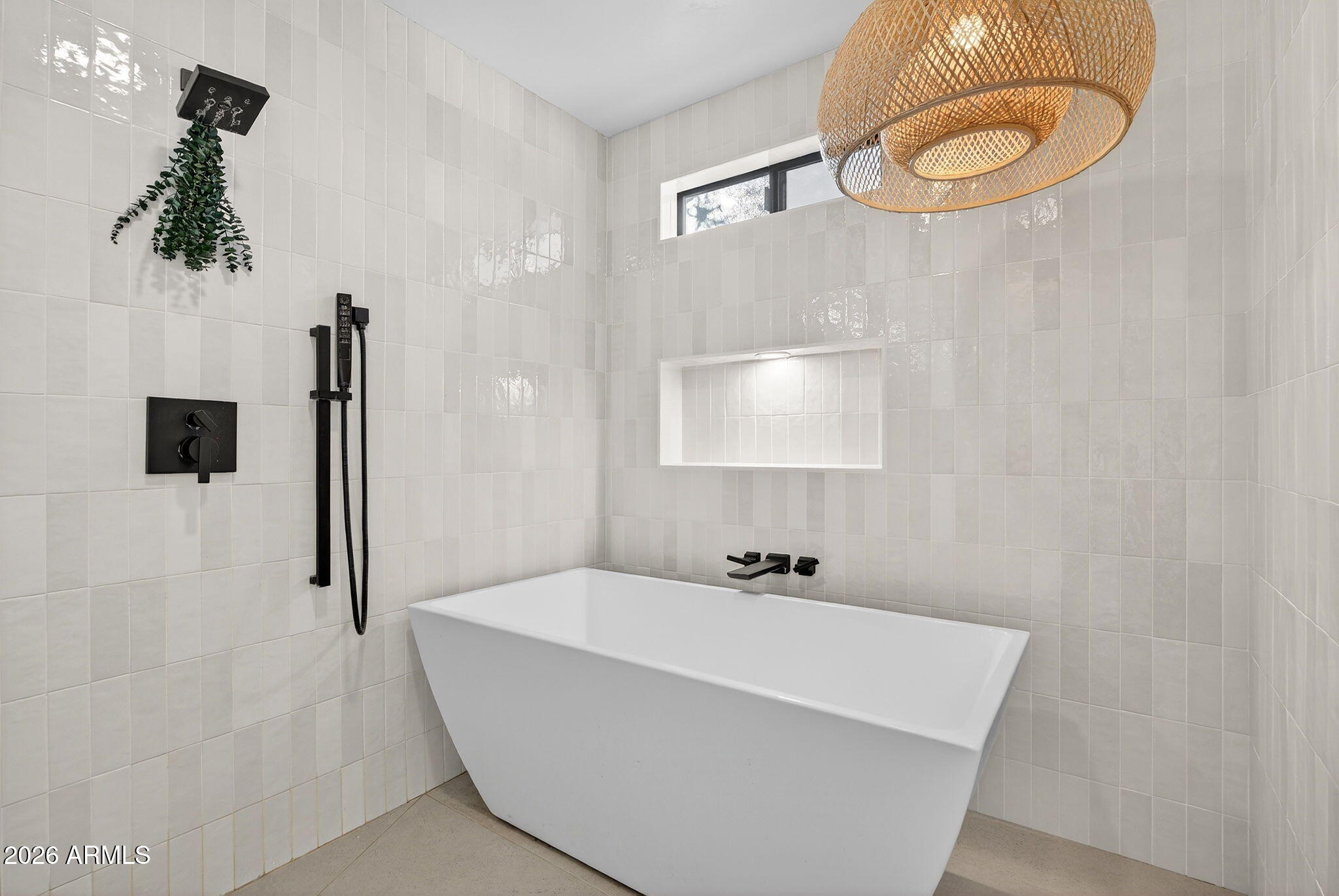 2223 East Claxton Avenue Gilbert, AZ 85297 - Photo 33 of 56 a bathroom with a bathtub and a shower