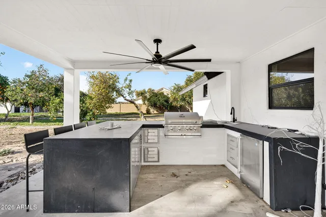 a kitchen with a sink and a stove