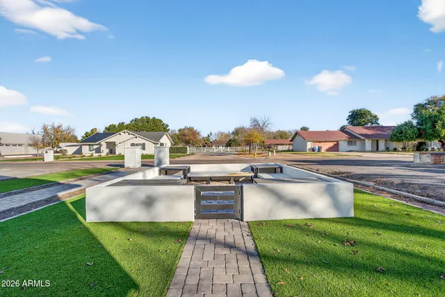 a view of house with outdoor space and swimming pool