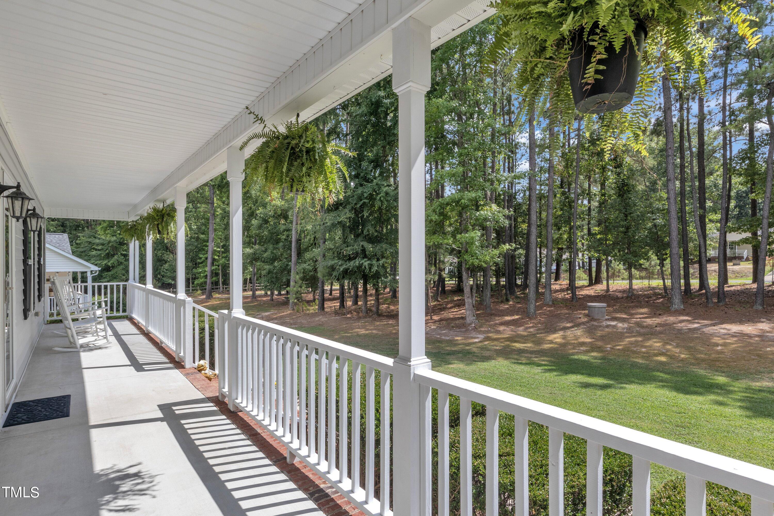 8805 Dukes Lake Road Zebulon, NC 27597 - Photo 4 of 26 Gracious Front Porch