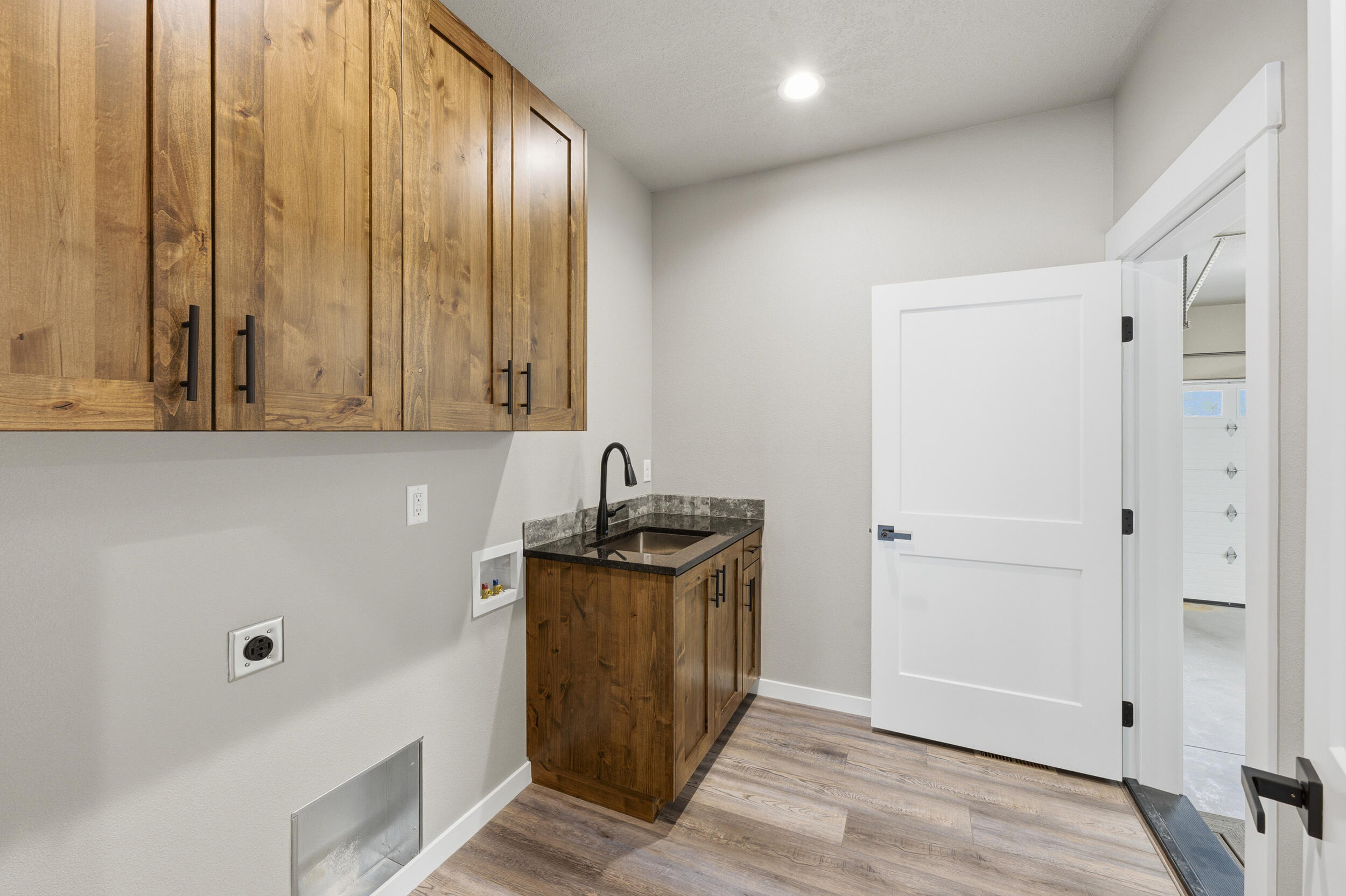 16083 Dyke Road, Unit 9 La Pine, OR 97739 - Photo 38 of 53 a view of a storage & utility room with a sink