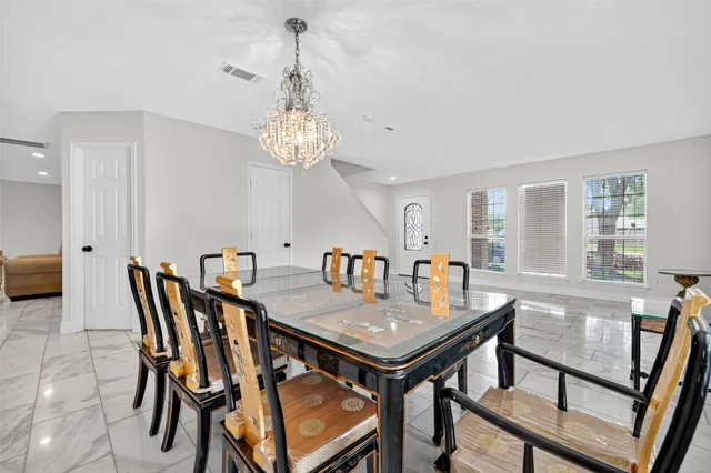 a vase of flowers sitting on a table
